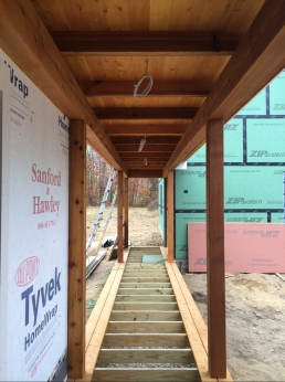 Walkway to the garage, cedar framed