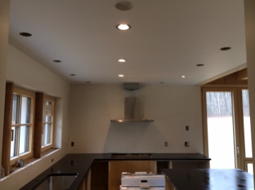 Testing four kinds of recessed lighting trims.